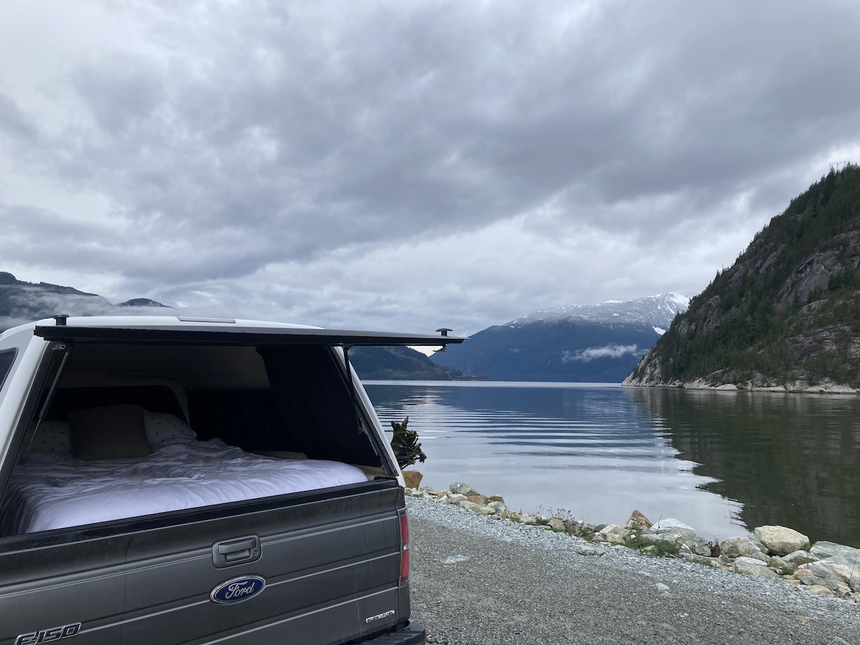 Sleeping in truck beside the ocean 