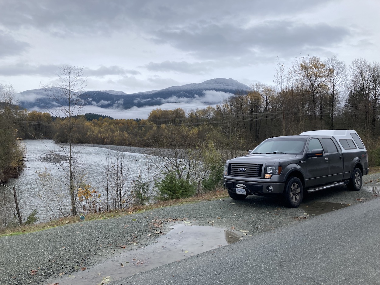 Sleeping beside a river in British Columbia in my truck 