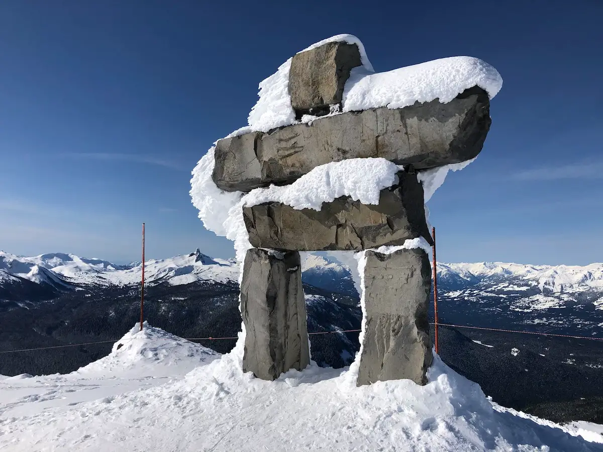 Inukshuk on top of the Peak of Whistler Mountain in British Columbia 