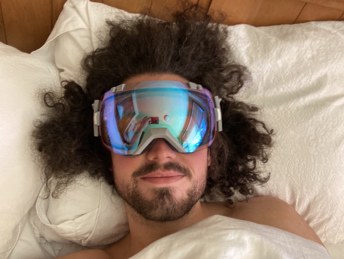 Sleeping and Dreaming of skiing with ski goggles on 