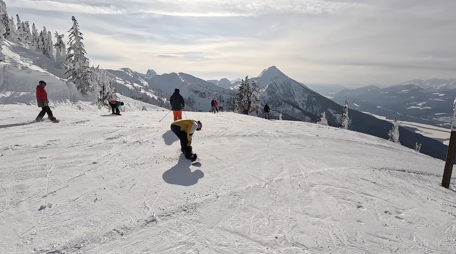 Standing at the top of the stoke chair at Revelstoke mountain resort 